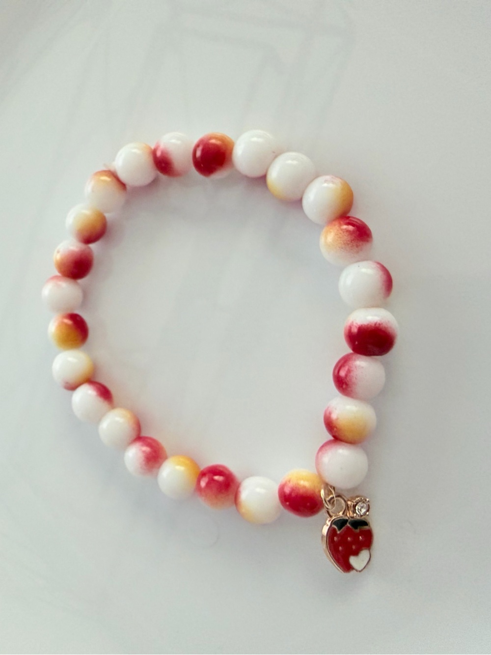 Pink & White Beaded Stretch Bracelet with Strawberry Charm
